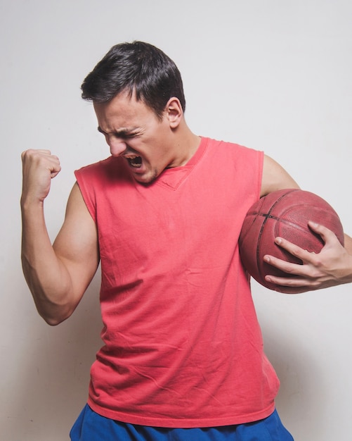 Free photo basketball player screaming