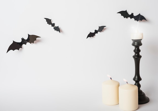 Free photo bats and flaming candles