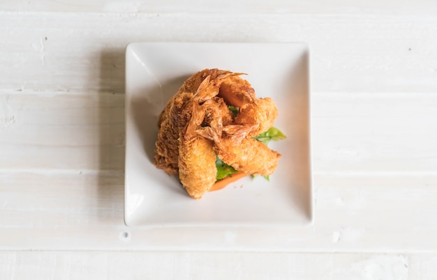 batter-fried prawns on wood