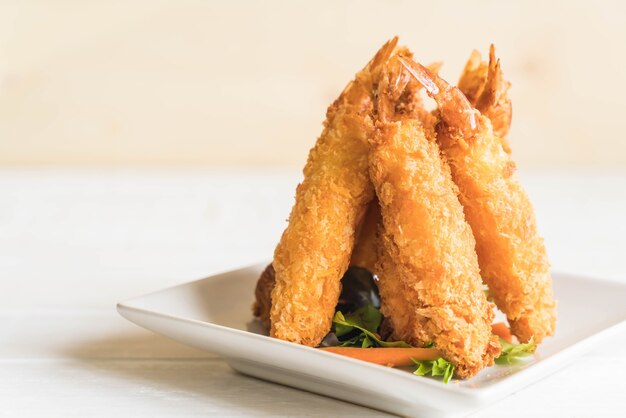 batter-fried prawns on wood