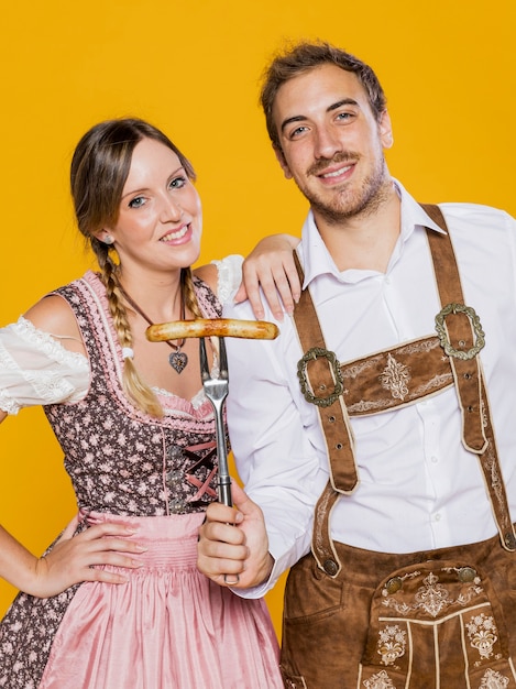 Free photo bavarian man and woman posing