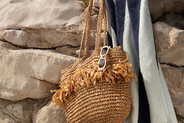 Free photo beach bag with essentials still life