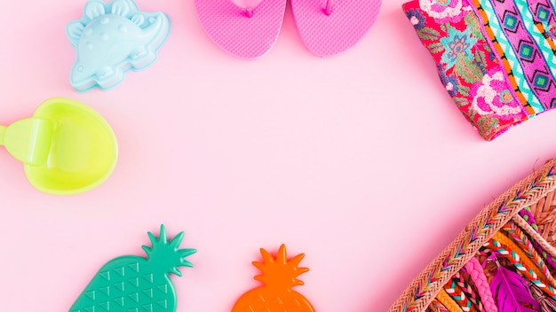 Beach marine items on pink background