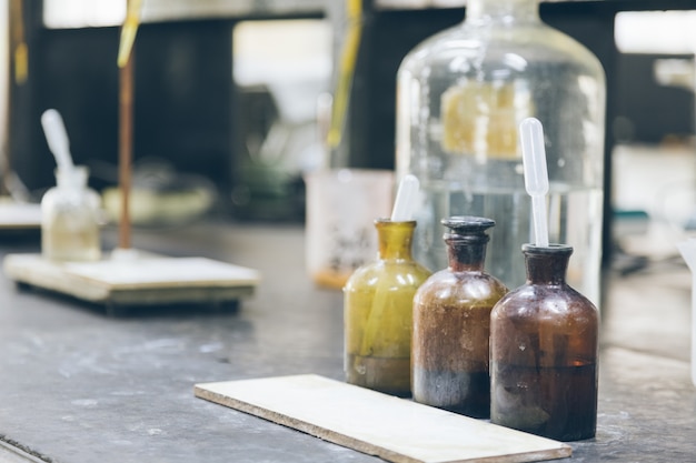 Beakers and equipment on table in factory laboratory