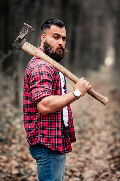 Free Photo beard chainsaw hipster lumberjack man axe