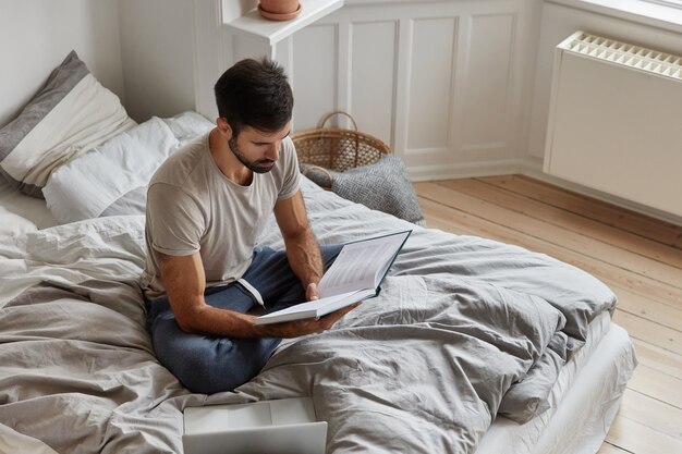 bearded guy posing at home while working