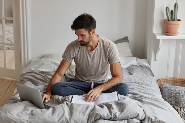 bearded guy posing at home while working