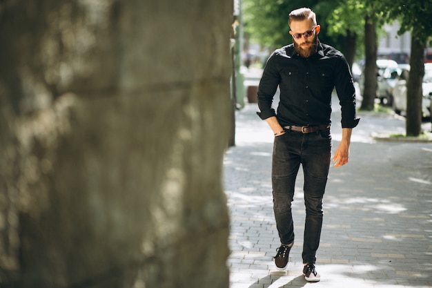 Free photo bearded man model in the street