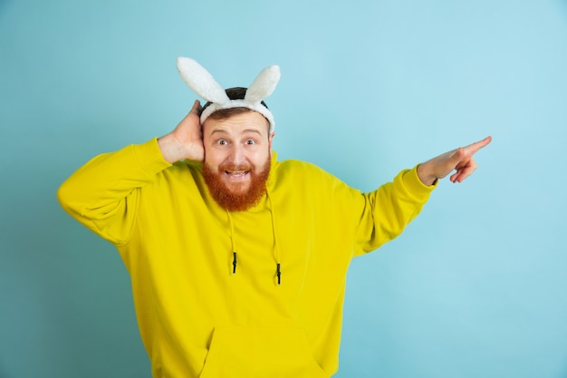 Free Photo bearded man with bunny ears for easter