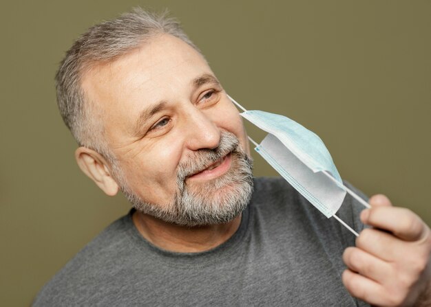 Bearded man with surgical mask