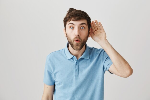 Bearded portrait of a young guy with blue Tshirt