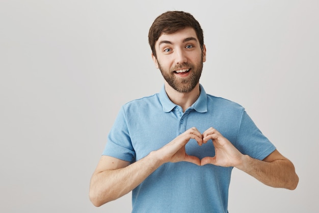 Bearded portrait of a young guy with blue Tshirt