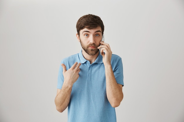 Bearded portrait of a young guy with blue Tshirt