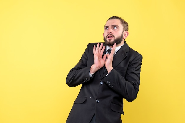 Bearded young man refusing something