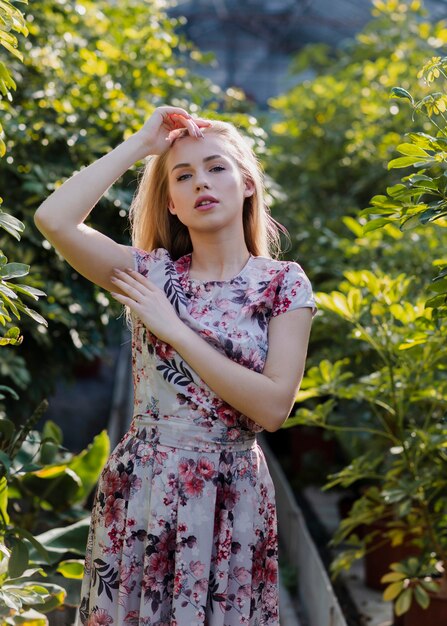 Beautful woman posing with foliage background