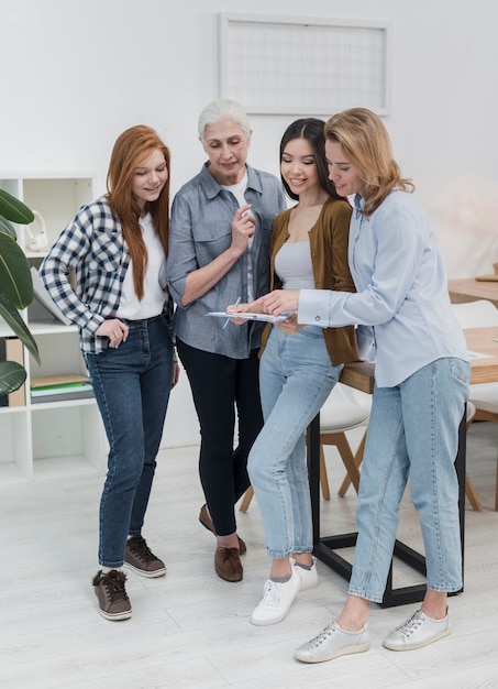 Beautiful adult women planning together