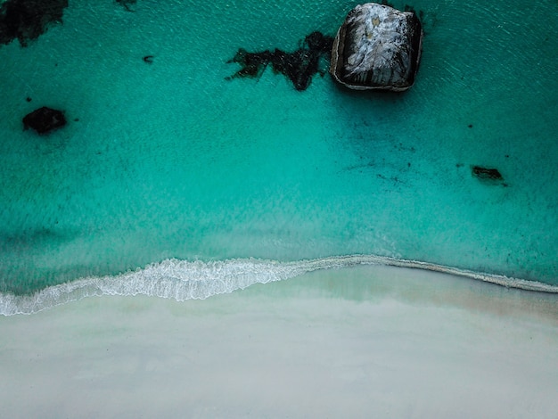 Free Photo beautiful aerial shot of the sea with mountains