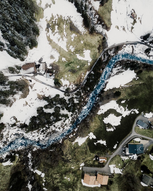 Free Photo beautiful aerial shot of a small suburban town in the snowy mountains