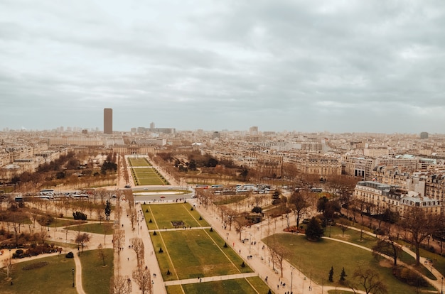 Free Photo beautiful aerial shot of tour eiffel gardens under the storm clouds