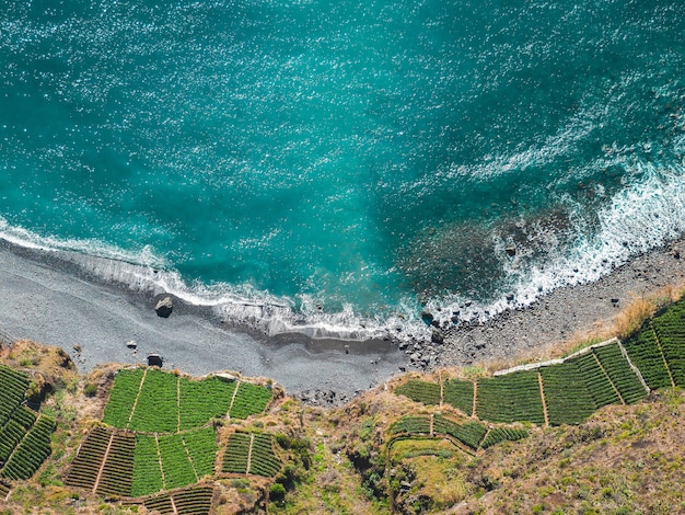 Beautiful aerial view of a turquoise beach during midday