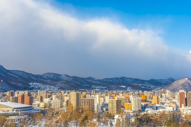 Beautiful architecture building with mountain landscape in winter season Sapporo city Hokkaido Japan