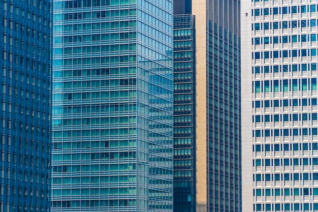 Free photo beautiful architecture office building skyscraper with window glass pattern