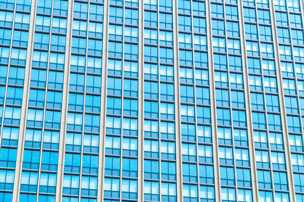 Beautiful architecture office building skyscraper with window glass pattern