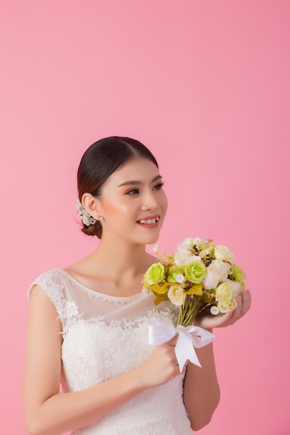 Beautiful asian bride portrait in pink 