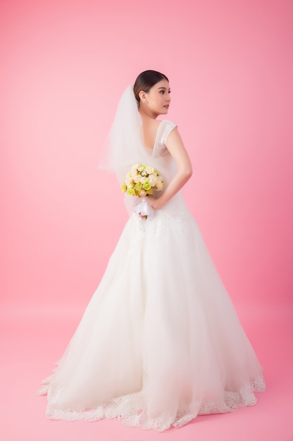 Beautiful asian bride portrait in pink