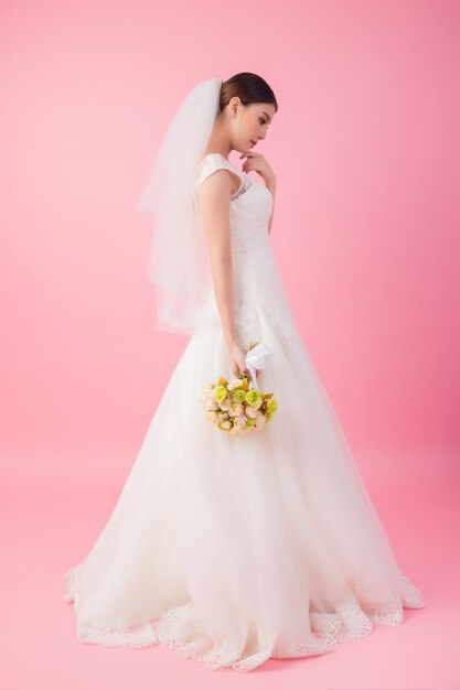 Beautiful asian bride portrait in pink 