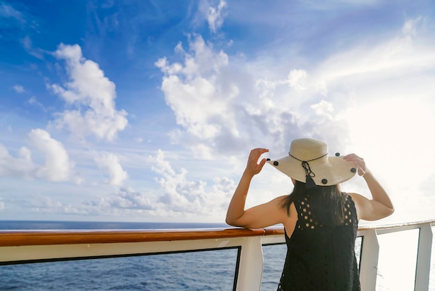 Free Photo beautiful asian female woman relax casual leisure peaceful moment on cruise deck vacation summer time