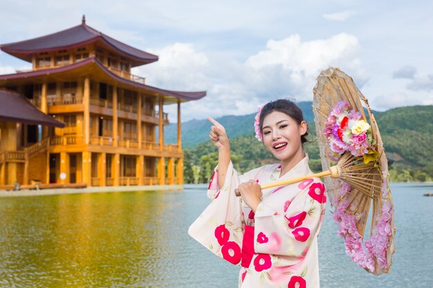 A beautiful Asian woman wearing a Japanese kimono, Traditional dress concept.