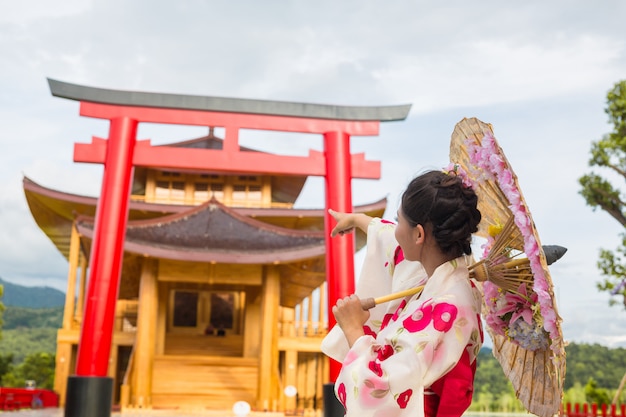 A beautiful Asian woman wearing a Japanese kimono, Traditional dress concept.