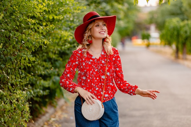 Free photo beautiful attractive stylish blond smiling woman in straw red hat and blouse summer fashion outfit