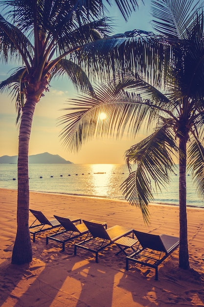 Beautiful beach and sea with palm tree