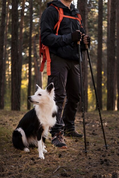 Beautiful black and white dog and his owner