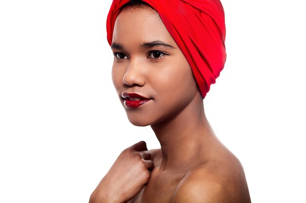 Beautiful black woman with red cloth on the head