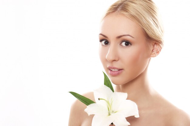 Beautiful blonde with lily flower