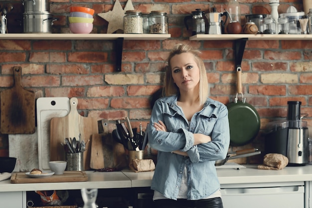 Beautiful blonde woman at home