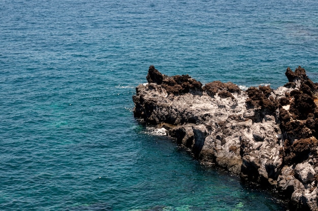 Free Photo beautiful blue sea water with rocks