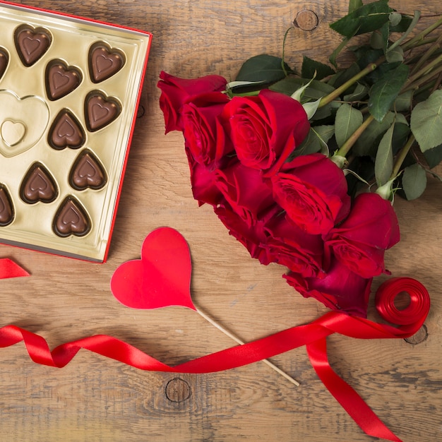 Beautiful bouquet of roses and chocolate