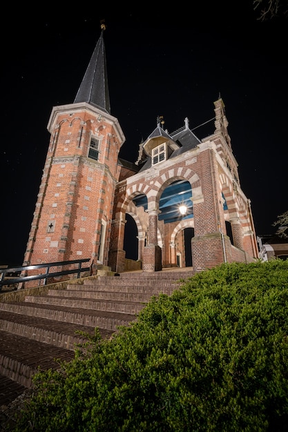 Beautiful brick building of Waterpoort Gate in the harbor of Sneek, Friesland, Netherlands