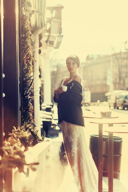 Free photo beautiful bride in an elegant white wedding dress