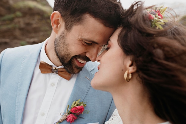 Beautiful bride and groom at the beach