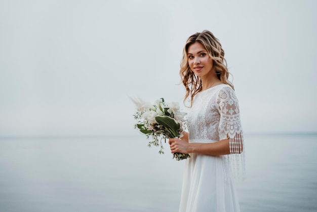 Beautiful bride portrait at the beach