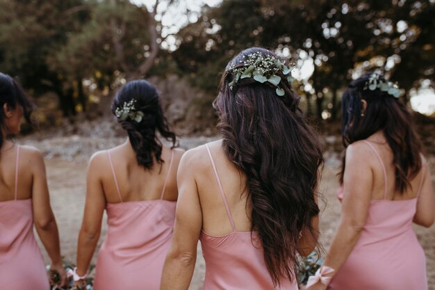 Beautiful bridesmaids celebrating their friend's wedding