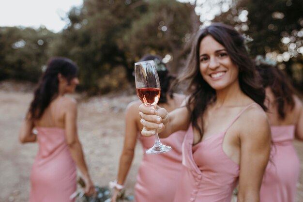 Beautiful bridesmaids celebrating their friend's wedding