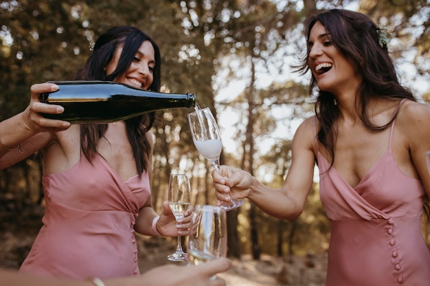 Free Photo beautiful bridesmaids having fun outdoors