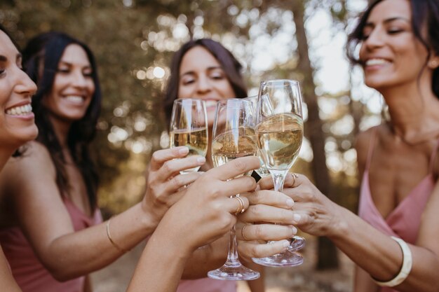 Beautiful bridesmaids having fun outdoors