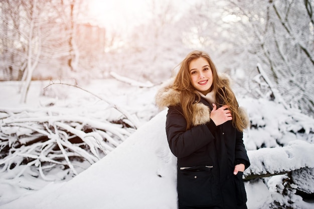 Free Photo beautiful brunette girl in winter warm clothing model on winter jacket